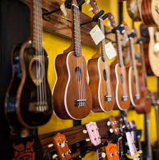 Wall of assorted ukuleles