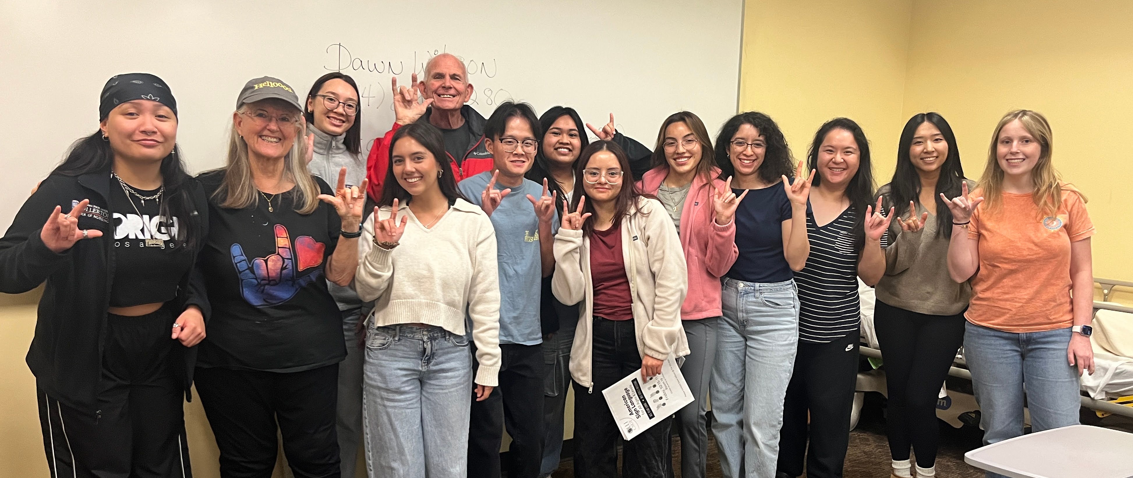 olli memebrs group picture with csuf students